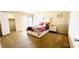 Bedroom featuring a bed, a nightstand, and sliding glass doors leading to a balcony at 631 Haven Pl, Tarpon Springs, FL 34689