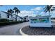 Sign for Palms of Tarpon Springs in front of community at 631 Haven Pl, Tarpon Springs, FL 34689