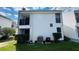 Well-maintained townhouse exterior with manicured lawn and visible unit numbers at 631 Haven Pl, Tarpon Springs, FL 34689