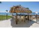 Tiki bar with seating overlooking the water with beautiful views of the bay at 650 Island Way # 204, Clearwater Beach, FL 33767
