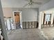View of the living room featuring tile floors and access to other rooms at 6706 Del Prado Ter, New Port Richey, FL 34652