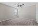 Neutral bedroom with a ceiling fan, window with blinds, and soft carpet at 7205 Ronnie Gardens Ct, Tampa, FL 33619
