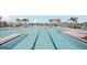 Enjoy swimming in the community pool with plenty of poolside seating for relaxing in the sun at 7205 Ronnie Gardens Ct, Tampa, FL 33619