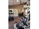 Well-equipped fitness center featuring various machines, weights, and ample space for exercise at 9100 Dr Martin Luther King Jr N St # 314, St Petersburg, FL 33702