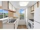 Well-lit kitchen with breakfast bar, providing scenic views while preparing meals at 9100 Dr Martin Luther King Jr N St # 314, St Petersburg, FL 33702
