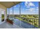 Relaxing balcony overlooking serene golf course and waterway at 960 Starkey Rd # 7202, Largo, FL 33771