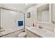 This bathroom features a shower/tub combo, a single sink, and neutral colors at 960 Starkey Rd # 7202, Largo, FL 33771