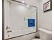 Bathroom featuring white subway tile shower, glass door, and modern fixtures at 960 Starkey Rd # 7202, Largo, FL 33771