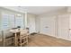 Cozy dining area with bright window, seating for four, and easy access to kitchen and storage at 960 Starkey Rd # 7202, Largo, FL 33771