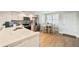 Bright kitchen with island and modern appliances, seamlessly connected to dining area, with ample counter space at 960 Starkey Rd # 7202, Largo, FL 33771