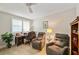 Office with two reclining chairs, a desk, and natural light from the window at 960 Starkey Rd # 7202, Largo, FL 33771