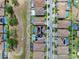 Aerial view of neighborhood showing a large green space and solar panels on roof at 11227 Hawks Fern Dr, Riverview, FL 33569