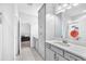 Bathroom featuring modern vanity, granite counters, tiled flooring, and a shower with a curtain at 11227 Hawks Fern Dr, Riverview, FL 33569