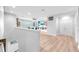Bright and airy bonus room with hardwood floors, recessed lighting, and neutral color palette at 11227 Hawks Fern Dr, Riverview, FL 33569