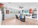 Game room with hardwood floors, recessed lighting, and lots of windows. A perfect space for entertaining friends at 11227 Hawks Fern Dr, Riverview, FL 33569