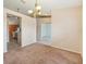 Open dining room leading to the kitchen and other living spaces at 12124 Colonial Estates Ln, Riverview, FL 33579