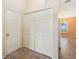 Entryway with tile flooring and coat closet at 12124 Colonial Estates Ln, Riverview, FL 33579