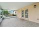 Relax and unwind on this tiled and screened lanai, perfect for enjoying the outdoors with comfort at 12124 Colonial Estates Ln, Riverview, FL 33579