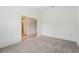 Bright living room with neutral walls and carpeted flooring at 12124 Colonial Estates Ln, Riverview, FL 33579