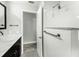 Remodeled bathroom with sleek fixtures and tiled shower at 14 Idlewilde Dr, Safety Harbor, FL 34695