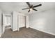 Clean bedroom features a closet, window, and neutral color palette at 14 Idlewilde Dr, Safety Harbor, FL 34695
