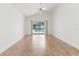 A spacious bedroom with tile flooring and sliding glass doors leading to the pool at 18005 Palm Breeze Dr, Tampa, FL 33647