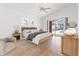 Bright bedroom with sliding glass doors leading to a pool and neutral tones throughout at 18005 Palm Breeze Dr, Tampa, FL 33647