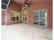 Covered patio with pool access features ample seating area with lots of natural light at 18005 Palm Breeze Dr, Tampa, FL 33647