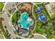 Aerial view of the community amenities including pool, playground, tennis and basketball courts at 1810 Tropical Oasis Ave, Plant City, FL 33565