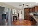 Spacious kitchen with tile floors, stainless steel refrigerator, and ample storage at 2049 Broadway, Clearwater, FL 33755