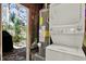 Utility room features a water heater and stacked washer/dryer at 2049 Broadway, Clearwater, FL 33755
