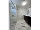 Bathroom features a large walk-in shower with dual vanities at 2117 W Clifton St, Tampa, FL 33603