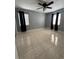 Bedroom featuring tile floor and minimal decor at 2117 W Clifton St, Tampa, FL 33603