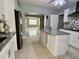 Spacious kitchen with granite countertops, stainless appliances, island and open layout at 2117 W Clifton St, Tampa, FL 33603