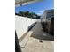 Side yard with a concrete path and a white privacy fence at 2117 W Clifton St, Tampa, FL 33603