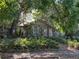 Quaint home surrounded by mature trees, shrubbery and natural vegetation at 2451 Quincy S St, St Petersburg, FL 33711