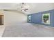 Bedroom with ceiling fan, and carpeted floors at 26180 Deep Creek Blvd, Punta Gorda, FL 33983
