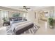 Bedroom features a ceiling fan, and tiled floors at 26180 Deep Creek Blvd, Punta Gorda, FL 33983