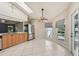 Eat-in kitchen featuring stainless steel appliances and views of the backyard pool at 26180 Deep Creek Blvd, Punta Gorda, FL 33983