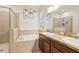 This bathroom features a double sink and soaking tub at 304 Shell Manor Dr, Ruskin, FL 33570