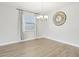 This dining room features laminate floors and is full of light at 304 Shell Manor Dr, Ruskin, FL 33570