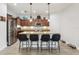 Kitchen island with granite countertops and stainless steel appliances at 304 Shell Manor Dr, Ruskin, FL 33570