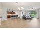 Open-concept living room showcasing a modern kitchen and comfortable seating area at 304 Shell Manor Dr, Ruskin, FL 33570