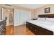 A bright main bedroom with a view of the ensuite bathroom and closet at 31 Island Way # 505, Clearwater Beach, FL 33767