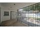 Exterior entrance with secure gated area and double doors to the main house at 3212 W Arch St, Tampa, FL 33607