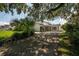 Charming single-Gathering home with mature landscaping and a spacious driveway at 3212 W Arch St, Tampa, FL 33607