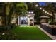 A charming backyard office or flex space with a sliding glass door sits within lush landscaping at 3505 W Kensington Ave, Tampa, FL 33629