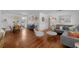 Open concept living room and dining room with hardwood floors and lots of natural light at 3505 W Kensington Ave, Tampa, FL 33629