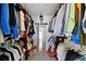Spacious walk-in closet with custom shelving and ample storage space at 3505 W Kensington Ave, Tampa, FL 33629
