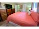 A bright bedroom with ample storage space from the multiple dressers at 3890 Mainlands N Blvd, Pinellas Park, FL 33782